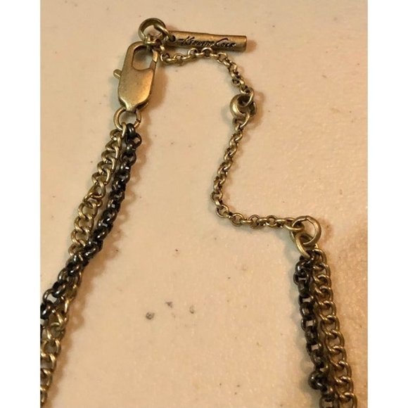 Kenneth Cole New York with interesting interlinking rings of different materials - Picture 3 of 4